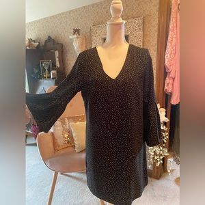 black dress with brown,white polka dots Bell sleeves.🤎🖤